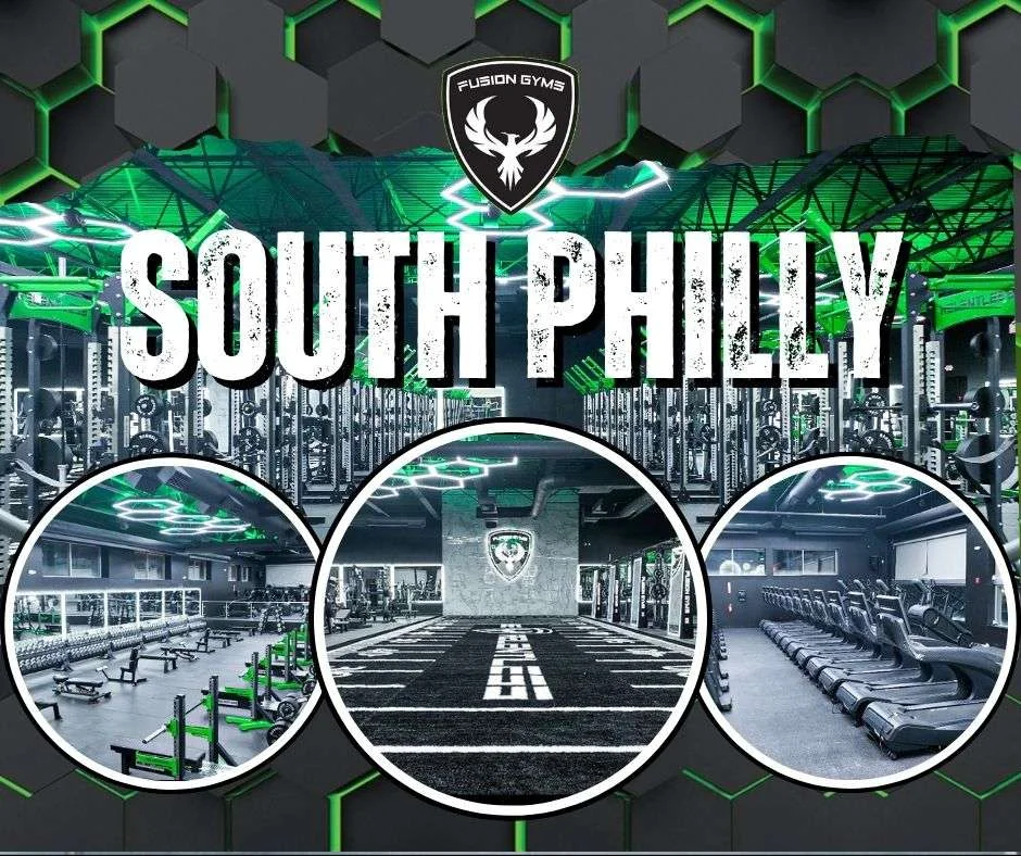 Fusion Gyms South Philadelphia: strength floor under green hexagon lights, turf lane by the logo wall, and treadmills